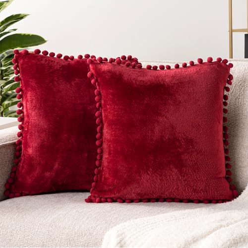PAVILIA Burgundy Red Throw Pillow Covers with Pom Pom 18x18 Set of 2, Decorative Pillow Cases for Bedroom Aesthetic, Small Throw Pillows Set for Bed, Velvet Euro Plush Cushion Covers for Sofa Couch - color: Wine Red, size: 18" x 18" (Pack of 2)