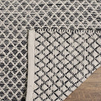 SAFAVIEH Montauk Collection Accent Rug - 4' x 6', Black & Ivory, Handmade Cotton, Ideal for High Traffic Areas in Entryway, Living Room, Bedroom (MTK601A)