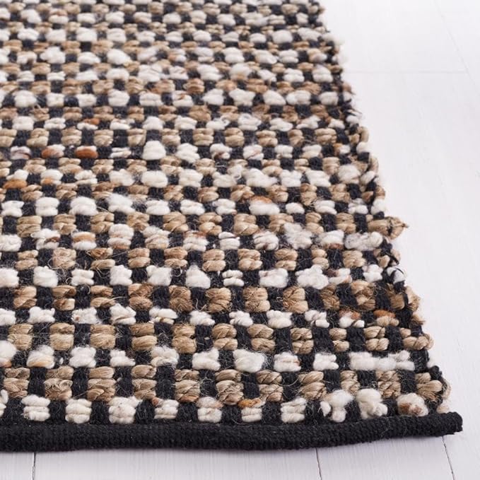 SAFAVIEH Natura Collection Area Rug - 6' x 9', Black & Ivory, Transitional Design, Ideal for High Traffic Areas in Living Room, Bedroom & Dining Room (NAT349Z-6)