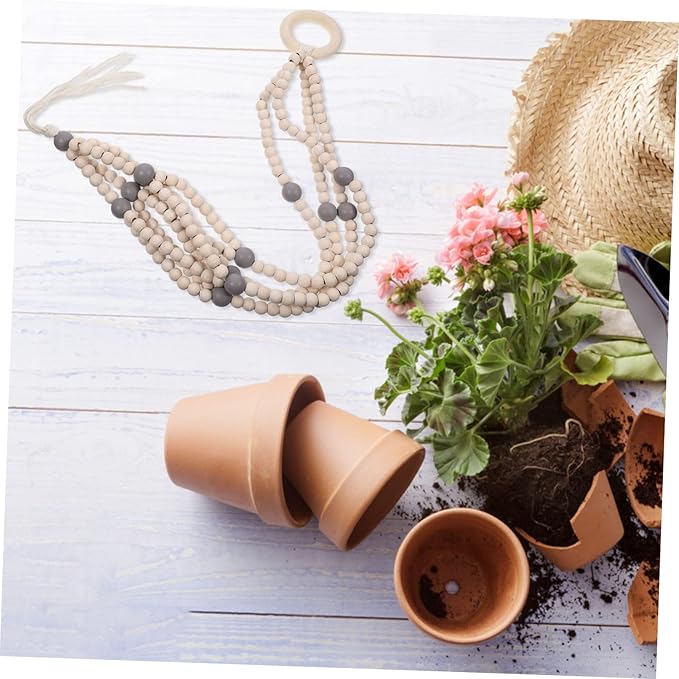 VICASKY Bohemian Wood Beads Hanging Planter Basket with Tassel Woven Cotton Rope Plant Hanger for Indoor Outdoor Flower Pot Holder Stylish Wall Mount Decor for Patio