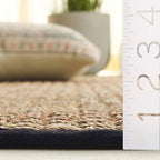 SAFAVIEH Area Rug 6' Square - Natural Fiber Collection - Natural & Black, Seagrass, Basketweave Pattern with Border (NF114C)