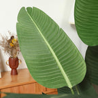 Artificial Bird of Paradise Plants 5Ft Fake Tropical Palm Tree with 10 Trunks in Pot and Woven Seagrass Belly Basket Perfect Faux Plant for Home Indoor Outdoor Office Modern Decor Green