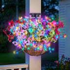 Solar Hanging Basket with Artificial Flowers: Outdoor Fake Flower Baskets with Solar String Lights for Fall Decor - 10 inch Plant Basket with Silk Faux Petunias for Porch Railing Fence Wall Door