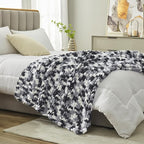 Amélie Home Chunky Knit Throw Blanket for Couch, Soft Chenille Crochet Blanket for Sofa, 50"x60", Space-Dyed Black