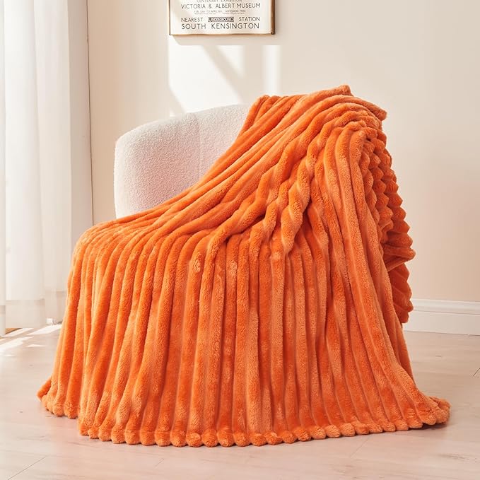 NEWCOSPLAY Super Soft Fall Throw Blanket Orange Premium Silky Flannel Fleece 3D Ribbed Jacquard Lightweight Bed Blanket All Season Use (Orange Ribbed, Throw(50"x60"))
