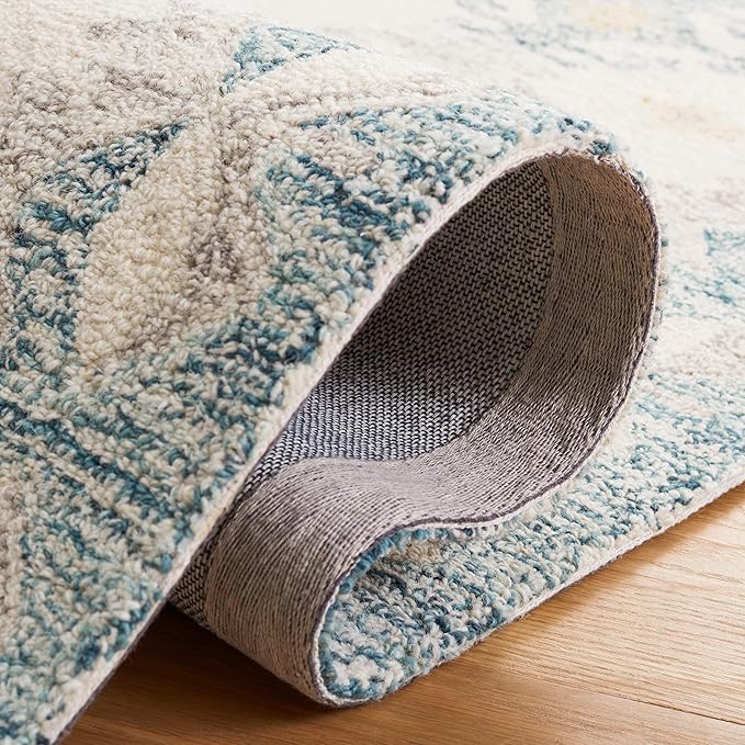 SAFAVIEH Micro-Loop Collection Accent Rug - 4' x 6', Ivory & Blue, Handmade Boho Rustic Wool, Ideal for High Traffic Areas in Entryway, Living Room, Bedroom (MLP476M)
