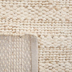 SAFAVIEH Natural Fiber Collection Area Rug - 9' x 12', Bleach, Handmade Jute, Braided Woven Design, Ideal for Living Room, Bedroom (NF212D)