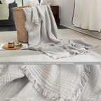 FOSSA Muslin Blanket with Fringe - 4-Layer 100% Cotton Gauze Super Soft & Breathable Throw -Lightweight Decorative Cooling Blanket for Bed, Sofa, Office -Oversize Queen Size 98" x 98" (Grayish)