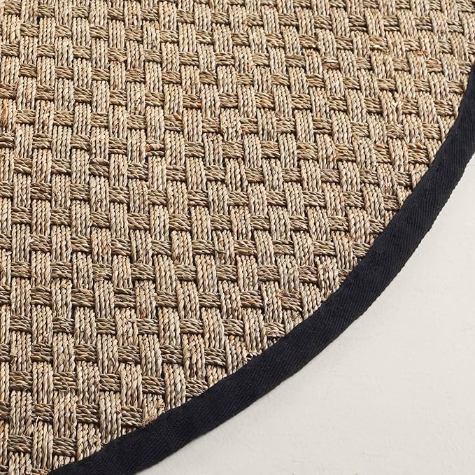 SAFAVIEH Area Rug 6x8 Oval - Natural Fiber Collection - Natural & Black, Seagrass, Basketweave Pattern with Border (NF114C)