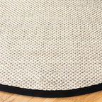 SAFAVIEH Area Rug 4' Round - Natural Fiber Collection - Marble & Black, Sisal, Woven Design with Border (NF143A)