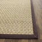 SAFAVIEH Natural Fiber Collection Area Rug - 2'6" x 4', Natural & Dark Brown, Seagrass, Basketweave Pattern with Border (NF114K)