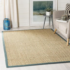 SAFAVIEH Area Rug 5x8 - Natural Fiber Collection - Natural & Light Blue, Seagrass, Basketweave Pattern with Border (NF114M)