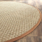 SAFAVIEH Area Rug 6' Round - Natural Fiber Collection - Natural & Brown, Seagrass, Basketweave Pattern with Border (NF114B)