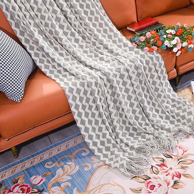 NTBAY Acrylic Knitted Throw Blanket, Lightweight and Soft Cozy Decorative Woven Blanket with Tassels for Travel, Couch, Bed, Sofa, 51x67 Inches, Light Grey Wave