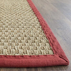 SAFAVIEH Area Rug 6x9 - Natural Fiber Collection - Natural & Red, Seagrass, Basketweave Pattern with Border (NF114D)
